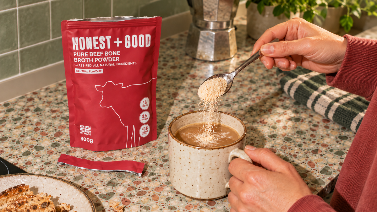 Pouring Pure beef Bone Broth into Coffee